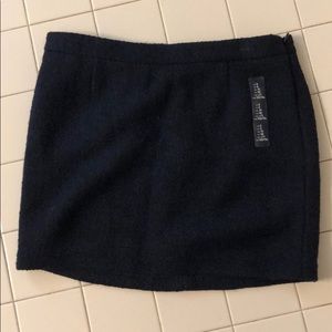 Navy blue lined wool like mini skirt